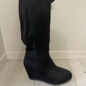 Thigh high heeled boots